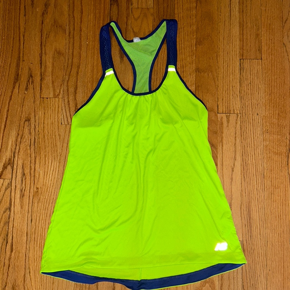 New balance super lightweight running tank. Medium- tags have Been removed